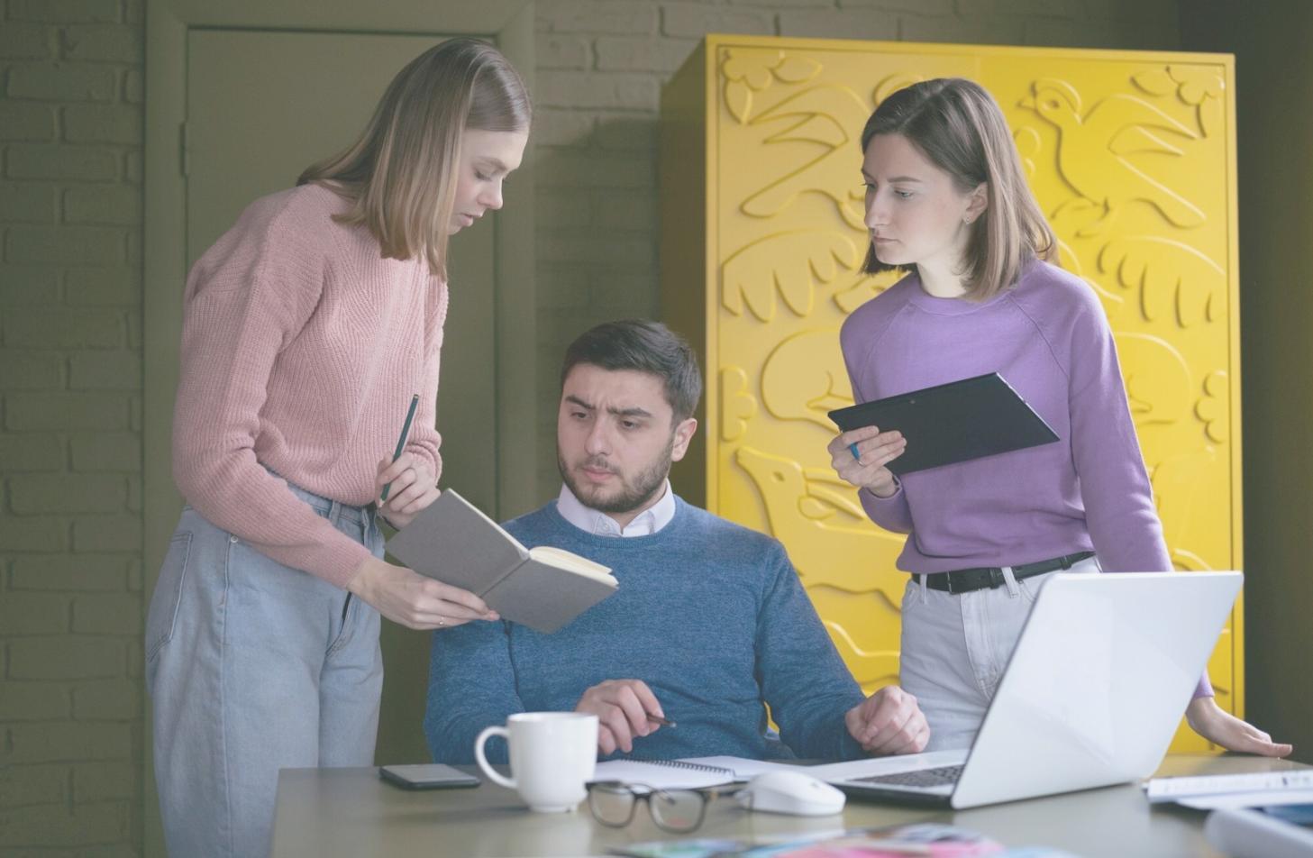 Investment education session showing financial charts and learning materials